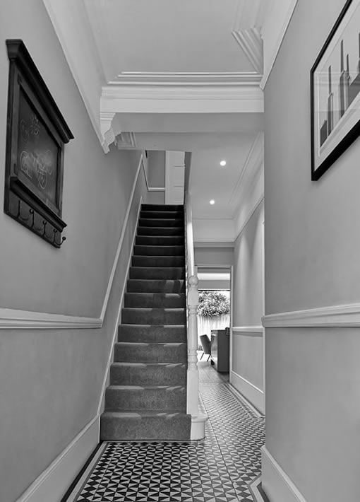 Internal photo of renovated hallway and stairs
