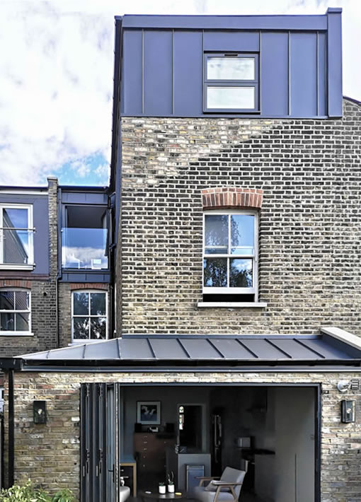 Photo of loft and kitchen extensions taken from the back garden