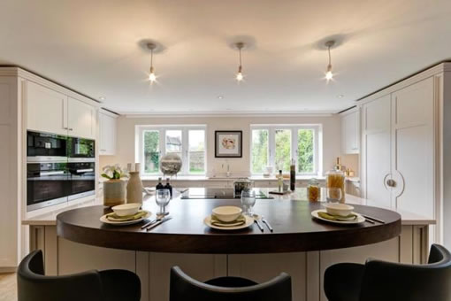 Internal photo of kitchen with large island once work was completed